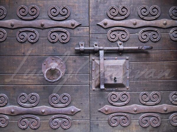 Wrought iron fittings on the entrance door of the Església de Sant Martí el Vell, Pyrénées Orientales, France