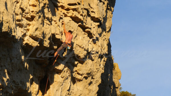 Mountaineer losing grip during a climb