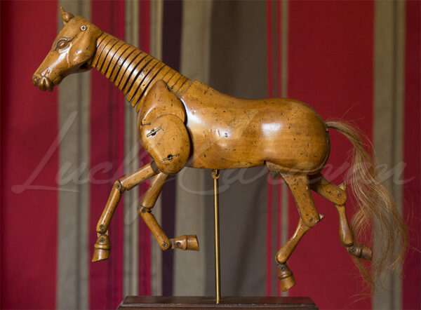 Articulated wooden horse