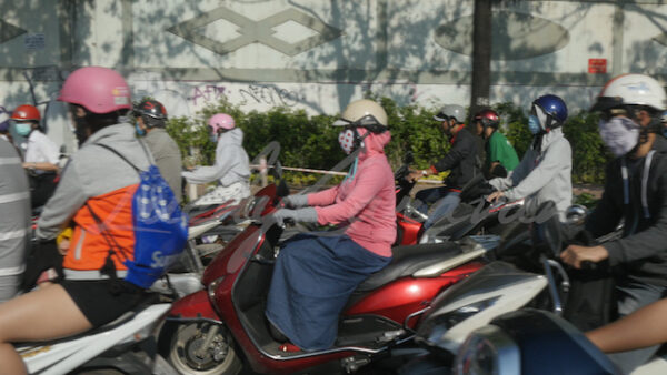 Scooters at rush hour in the center of Ho Chi Minh City (Saigon), Vietnam