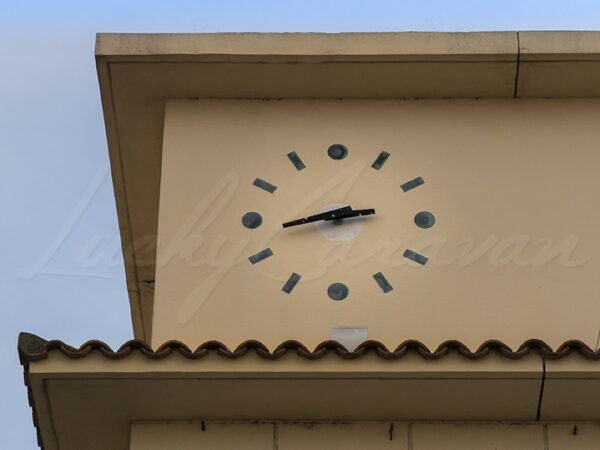 Clock of a Mediterranean seaside resort facade