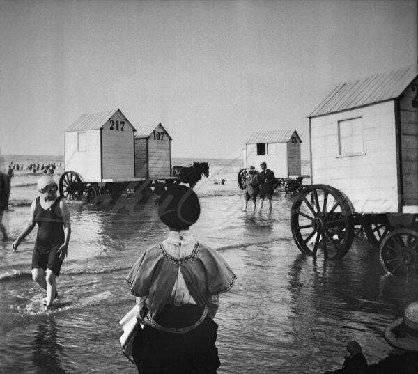 Bathers among their cabins in 1911, Ostend, Belgium.