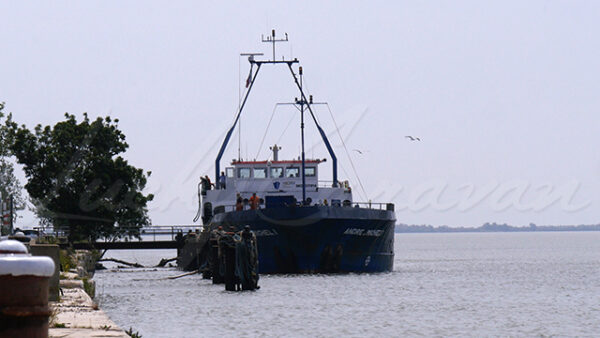 Mooring of a barge at a pontoon on the Rhône River in Port Saint Louis du Rhône, France