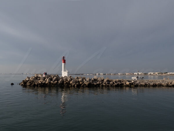 Lighthouse on the breakwater of Grau Du Roi, France