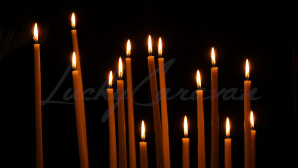 Candles burning in a church