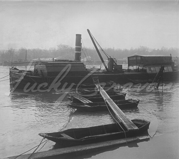 Makeshift floating bridge to a barge during the Paris floods of 1910