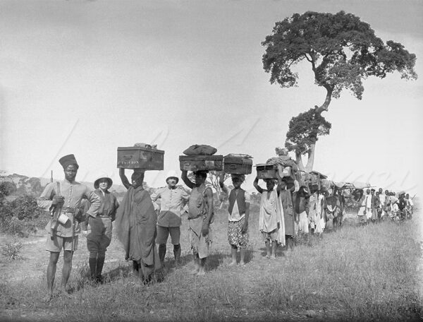 Procession of porters from a colonial expedition in Senegal around 1930