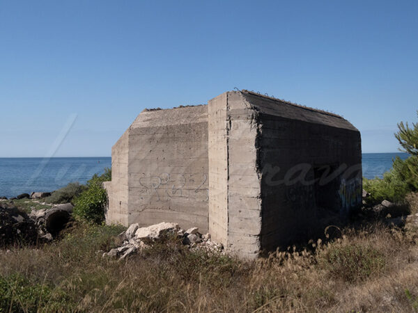Remains of a German bunker on the Mediterranean coast, Provence, France