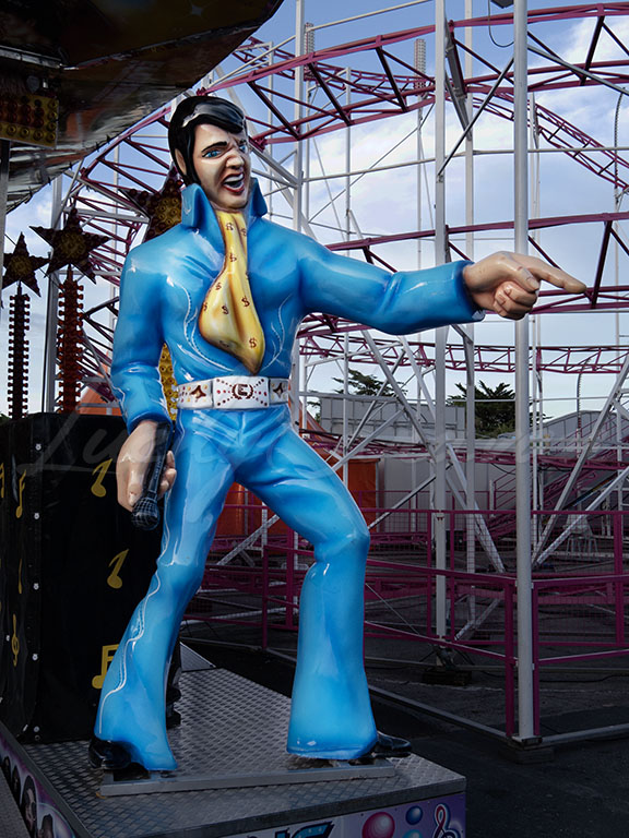 Resin statue of Elvis at a funfair