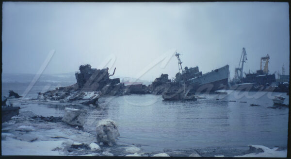 Sunken ships and dismantled submarine in Murmansk harbor on the Barents Sea, Arctic Circle, Russia, 1997