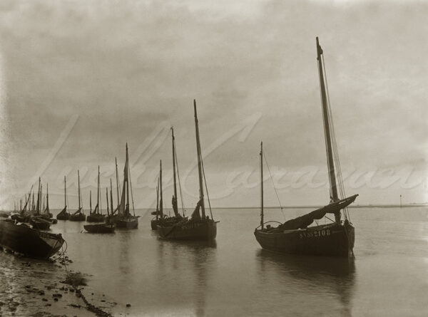 Traditional fishing boats in Somme Bay, France, circa 1900