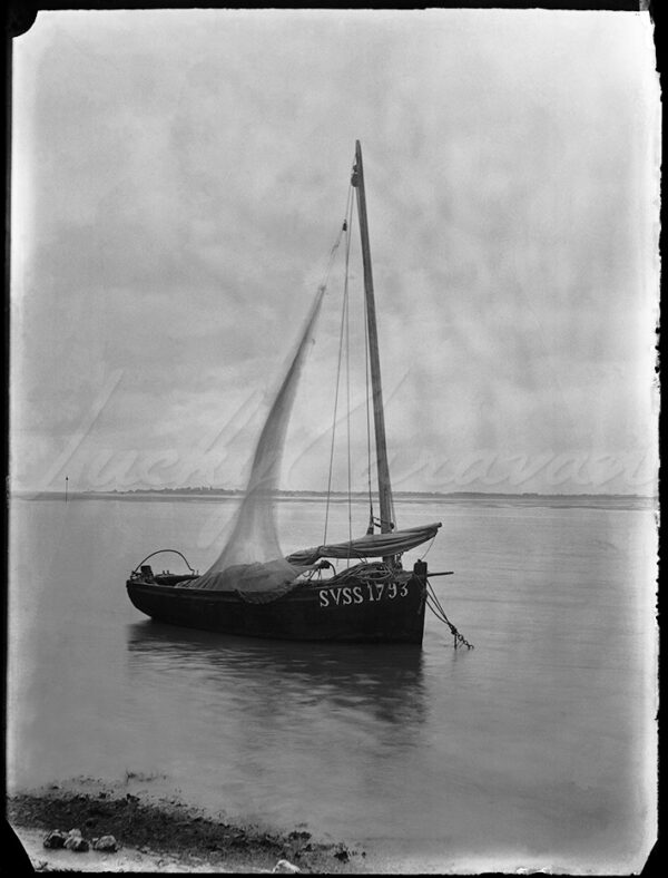 Traditional fishing boat in Somme Bay, France, circa 1900