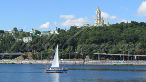 Sailing on the Dnieper in front of the Kyiv Pechersk Lavra or Kyiv Monastery of the Caves, Ukraine