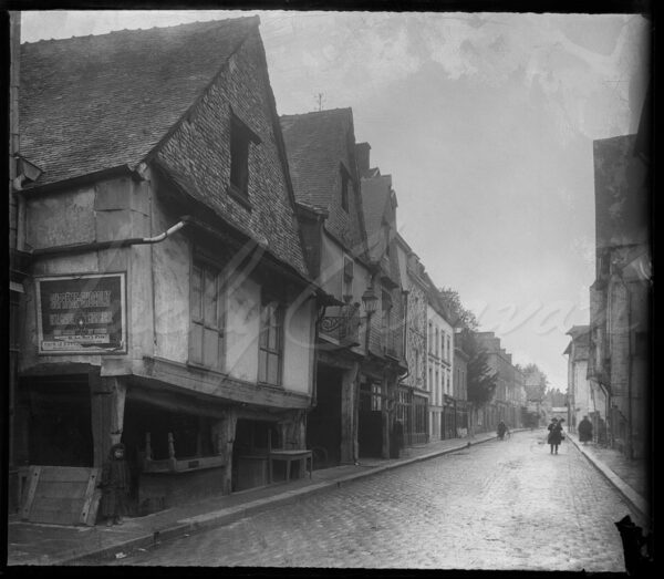 15th-century houses in Vitré, a traditional French village, circa 1900.