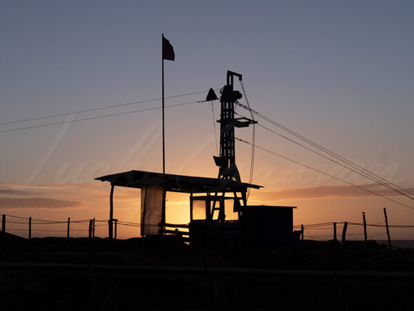 Cable system at an industrial site at sunset.