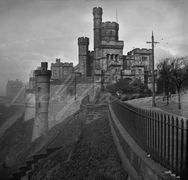 Calton Jail, Edinburgh, Scotland circa 1930 when demolition work started. In 1817 Architect Archibald Elliot expanded the initial facility, creating a Scottish Baronial style fortress with turrets and battlements, a design so imposing that visitors often mistook it for Edinburgh Castle.