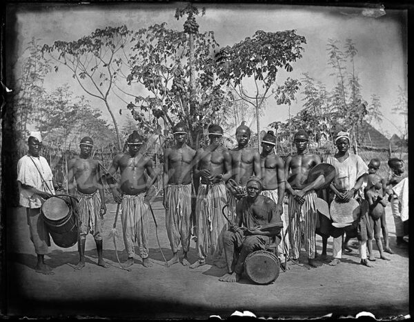 African villagers during a traditional ceremony in the Guinean bush around 1900.