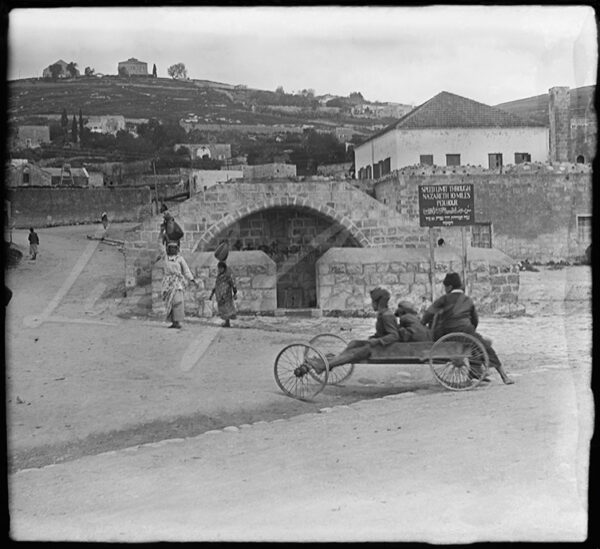 Palestine. Women carrying water jugs at the Fountain of the Virgin Mary in Nazareth in the early 20th century.