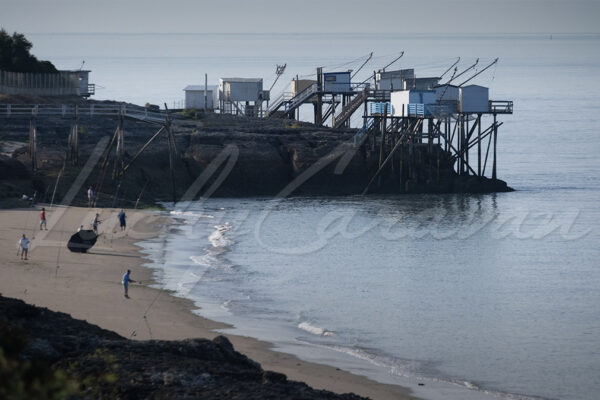 Traditional fishermen's huts on stilts with carrelets nets on the coast of Charente Maritime, France